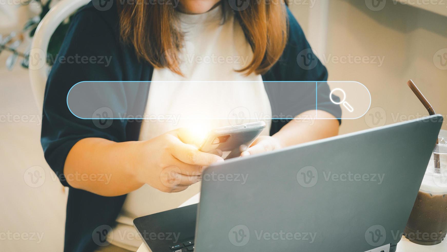 Data Search Technology Search Engine Optimization. woman's are using a computer notebook and mobile to Searching for information. Using Search Console with your website. photo