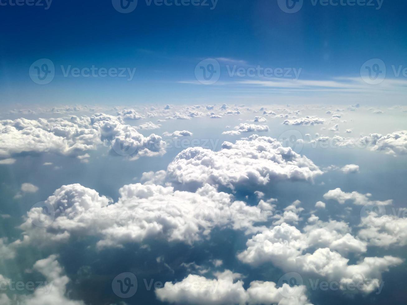 Blue sky with clouds background photo