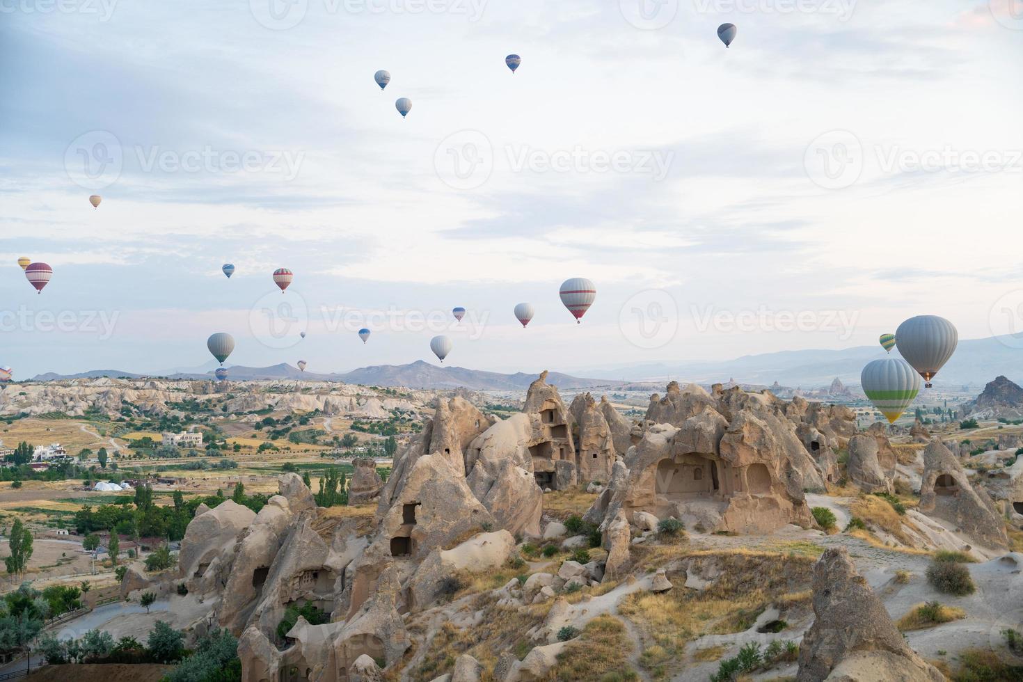 beautiful scenery flight of balloons in the mountains of Cappadocia photo