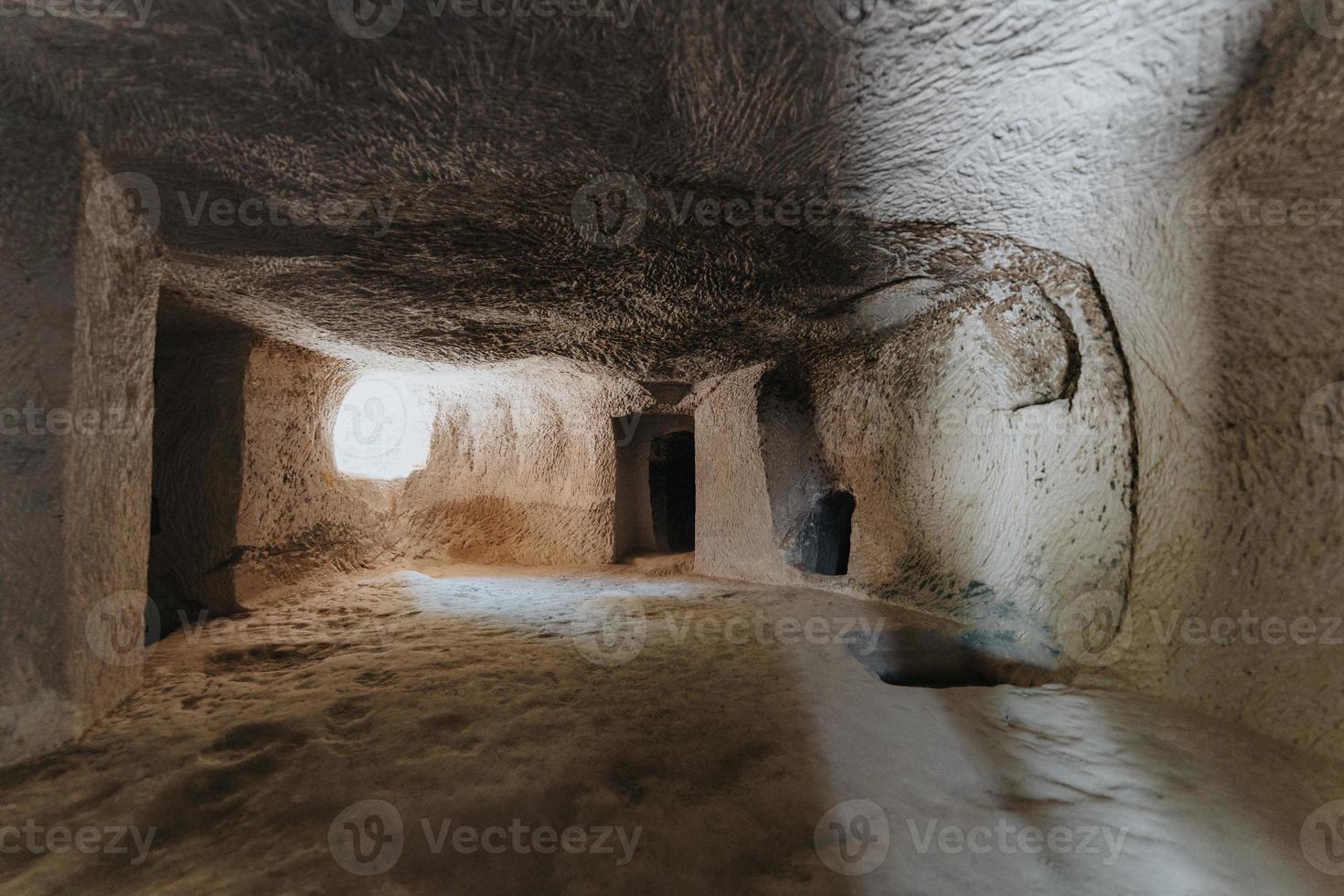A cave church in cappadocia with inscriptions on the walls frescoes