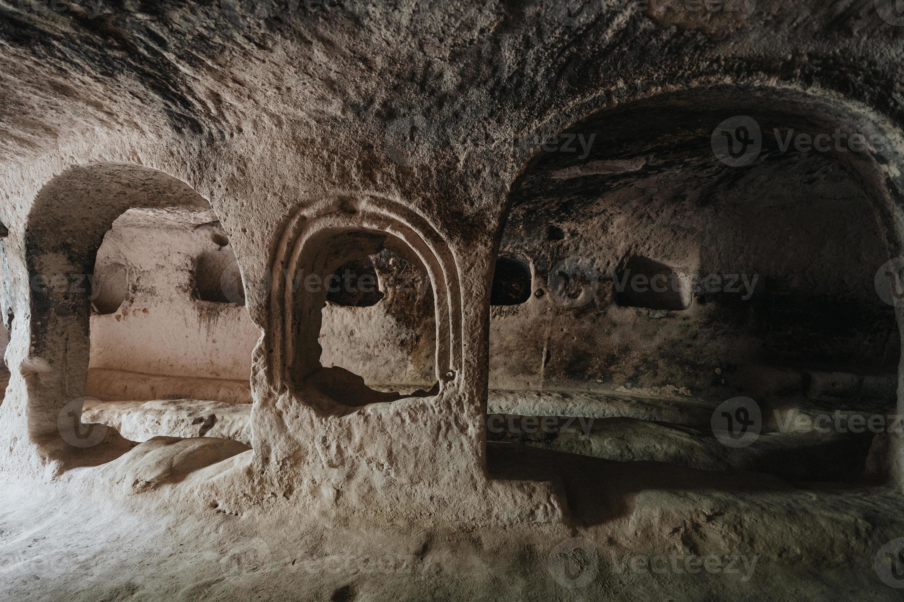 A cave church in cappadocia with inscriptions on the walls frescoes
