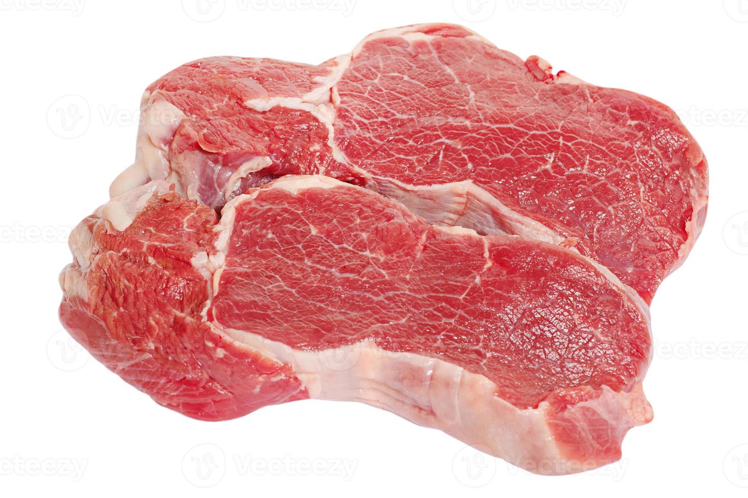 Two raw beef steaks on a white background. Meat isolate. photo