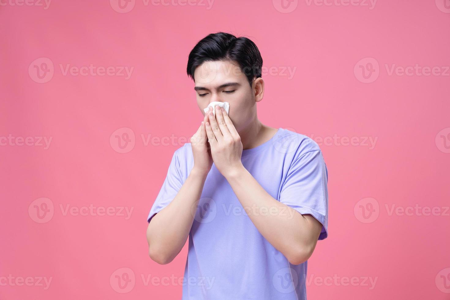 Young Asian man sick, illness on background photo