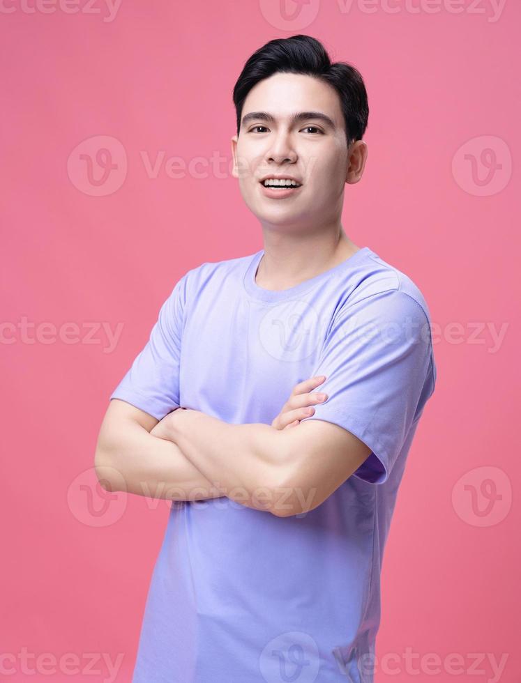 Portrait of young Asian man on background photo