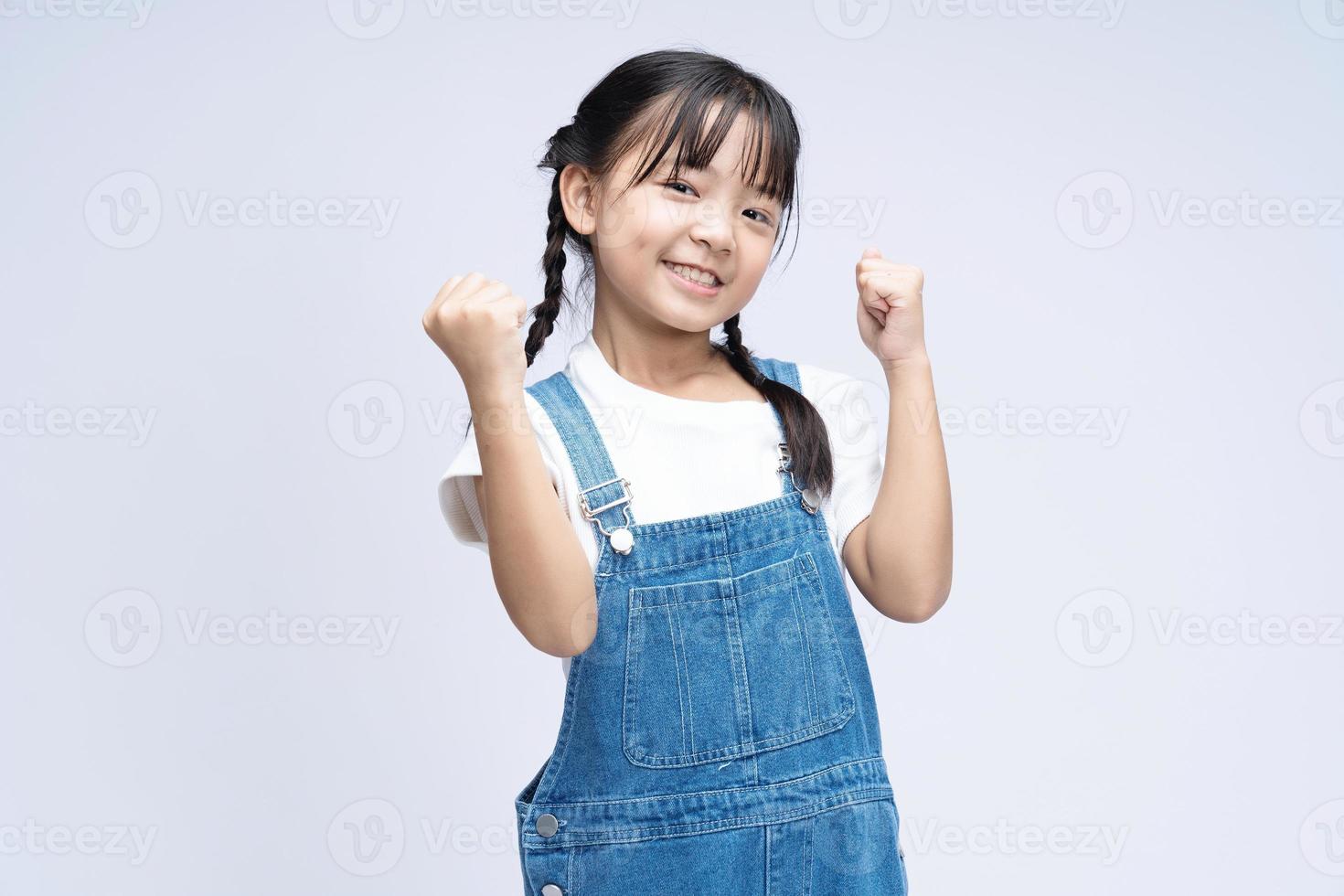 Portrait of Asian child on background photo