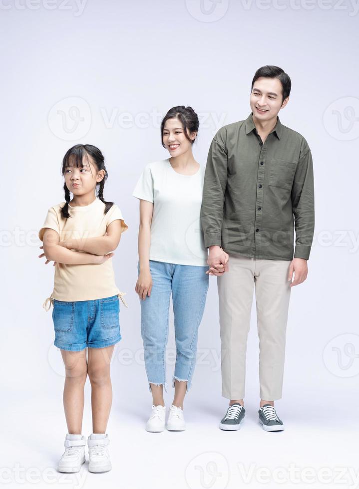 Image of Asian family on background photo