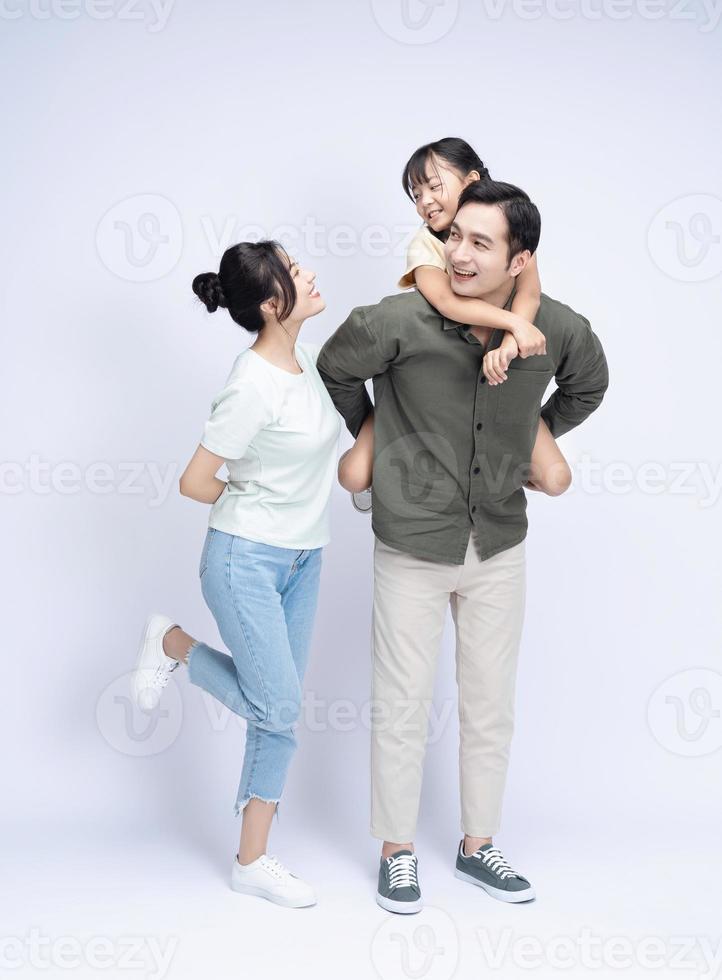 Image of Asian family on background photo