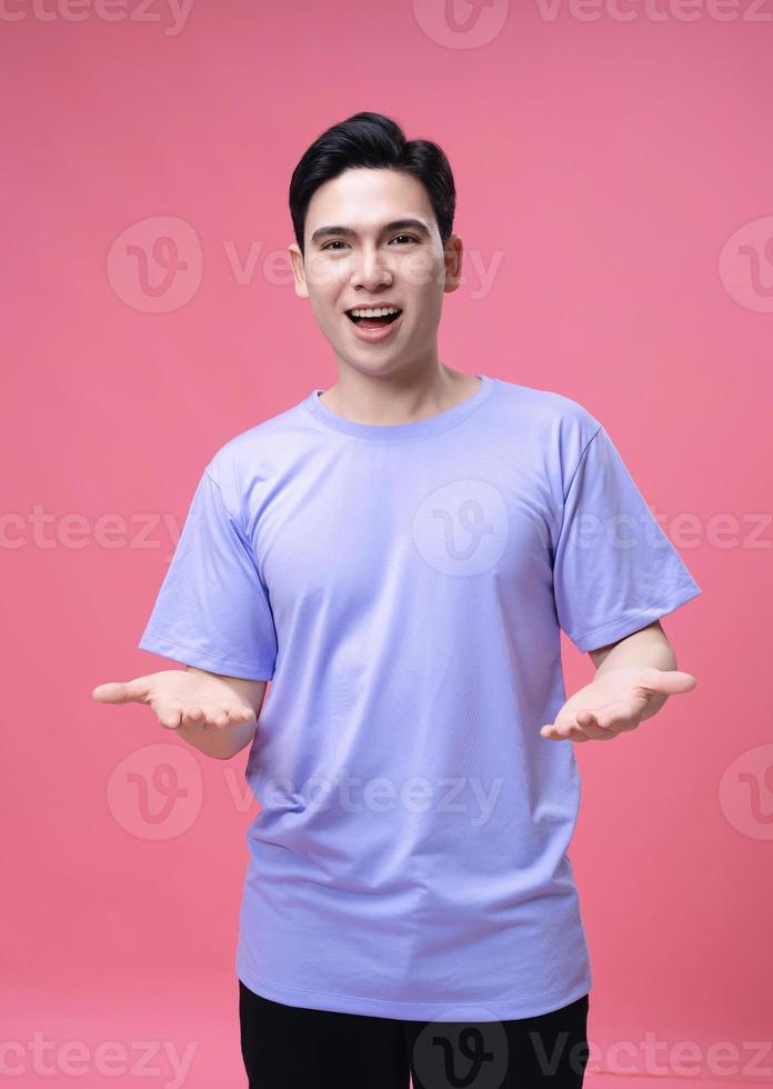 Portrait of young Asian man on background photo