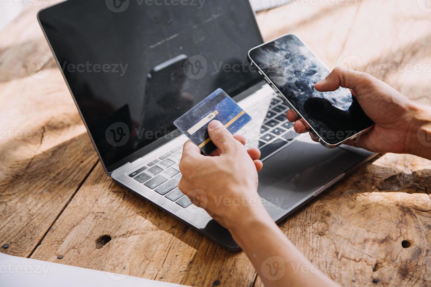 Businesswoman hands holding cradit card and using credit card online shopping. Online shopping concept photo