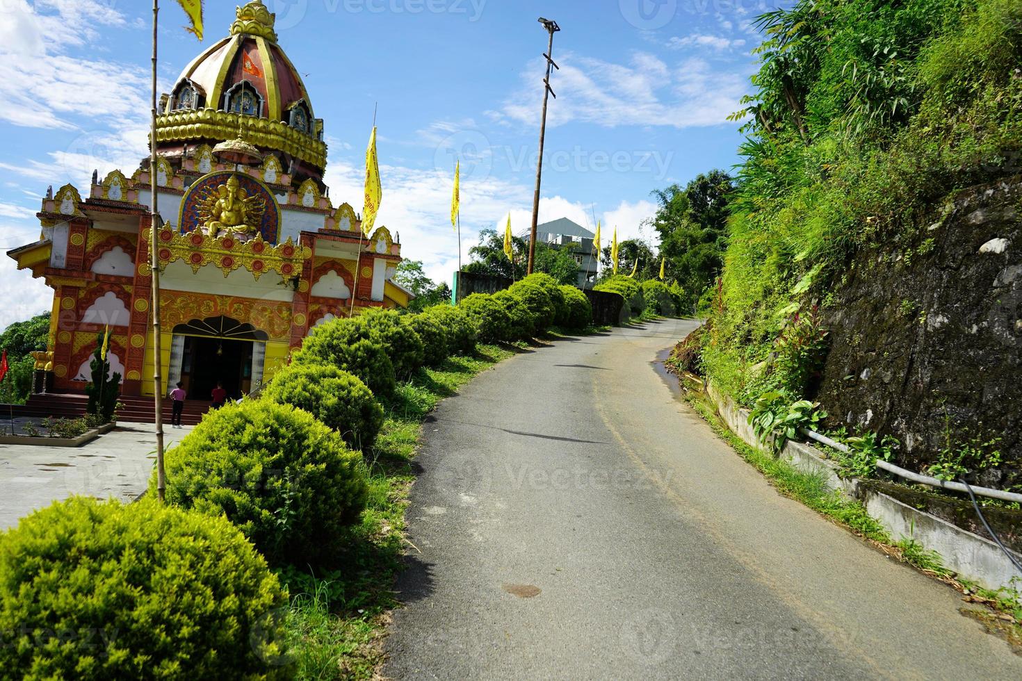 Angel Wise view of Siddhivinayak Temple in Sikkim With Nature and Uphill Road photo
