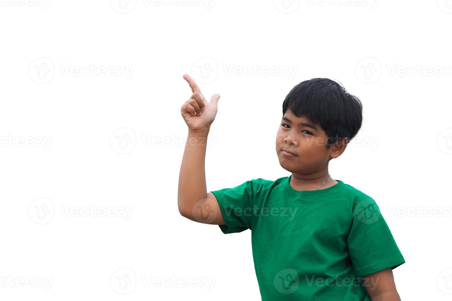 The boy smiled and pointed his hand to his side. on a white background photo