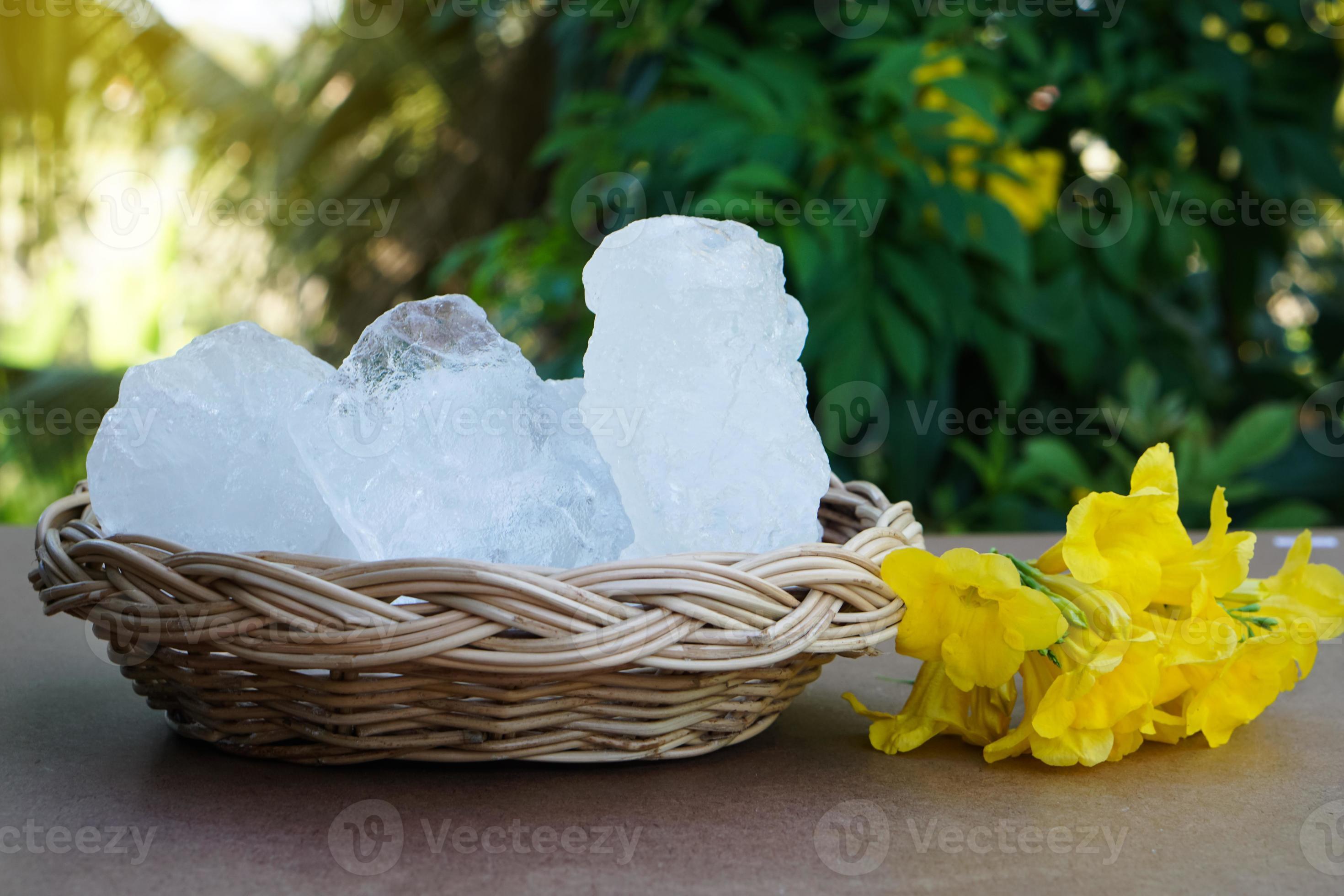 Basket of Crystal clear alum stones or Potassium alum placed outdoor