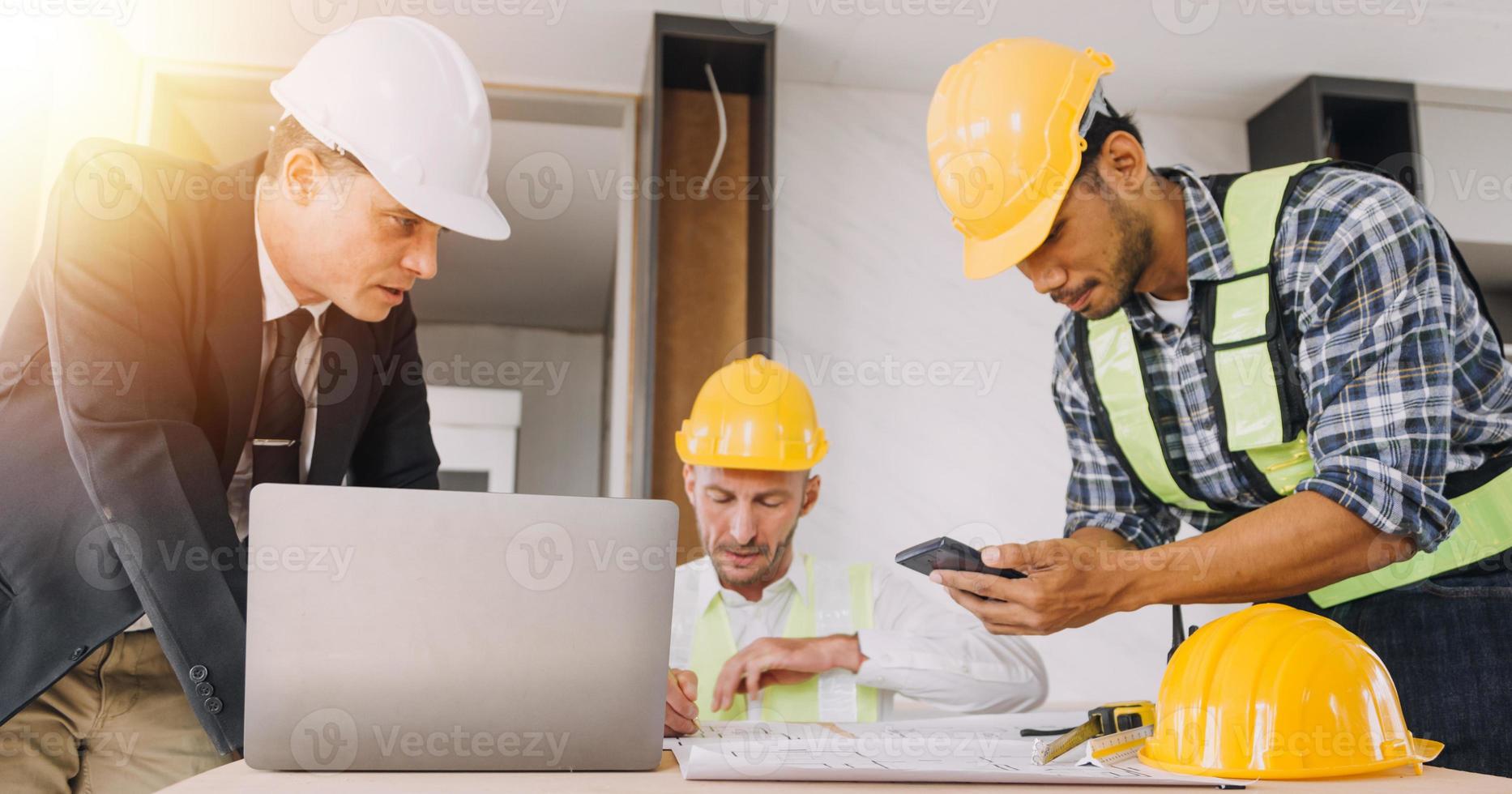 Architect concept, Architects working with blueprints in the office, Vintage Effect photo