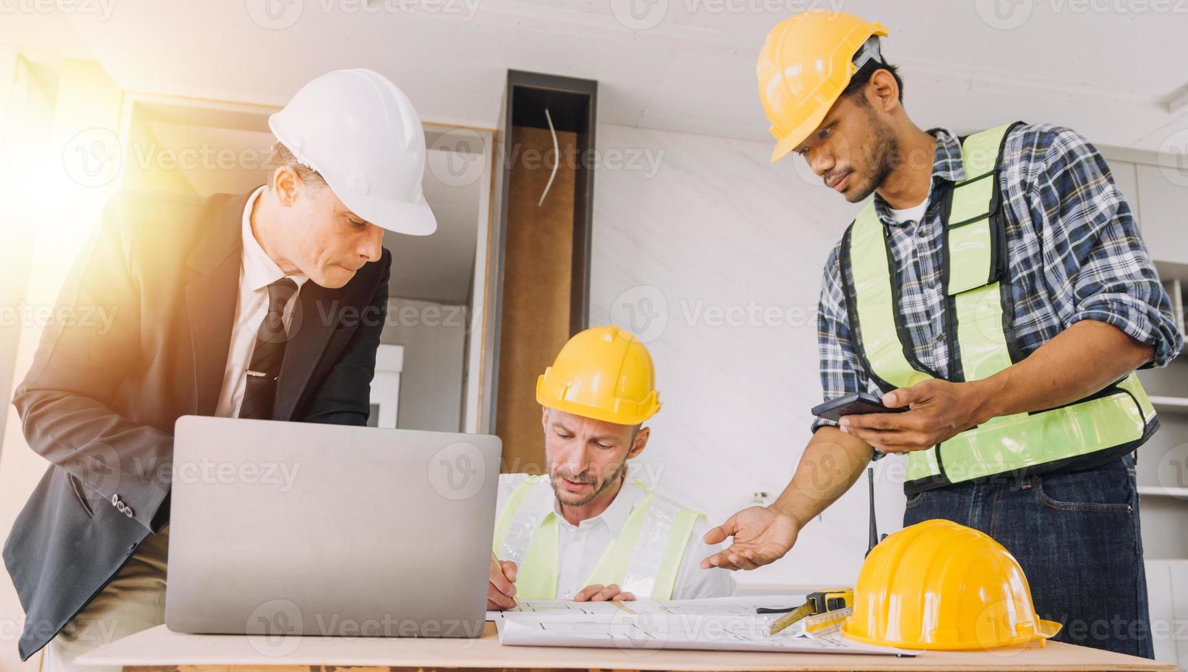 Architect concept, Architects working with blueprints in the office, Vintage Effect photo
