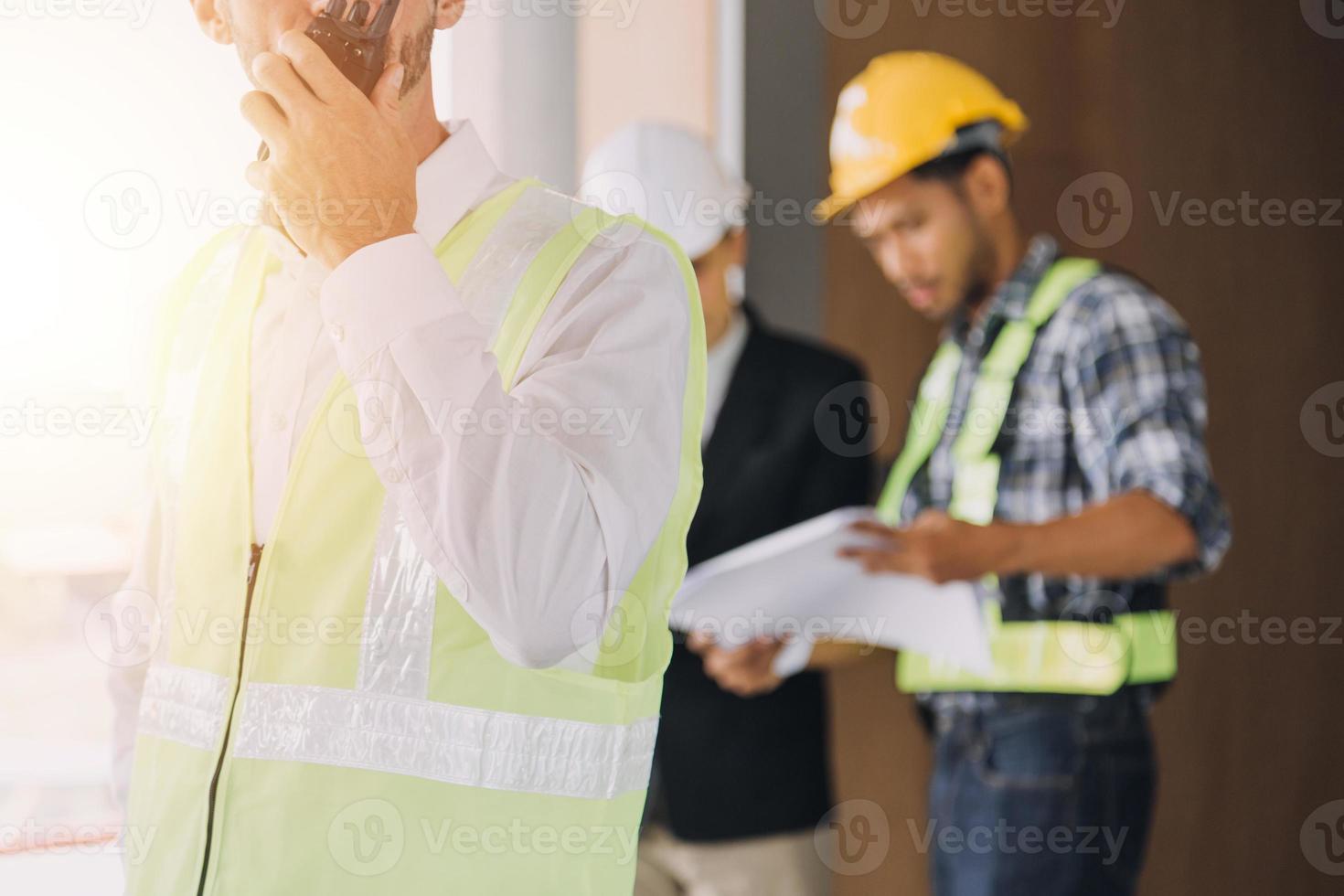 Architect concept, Architects working with blueprints in the office, Vintage Effect photo