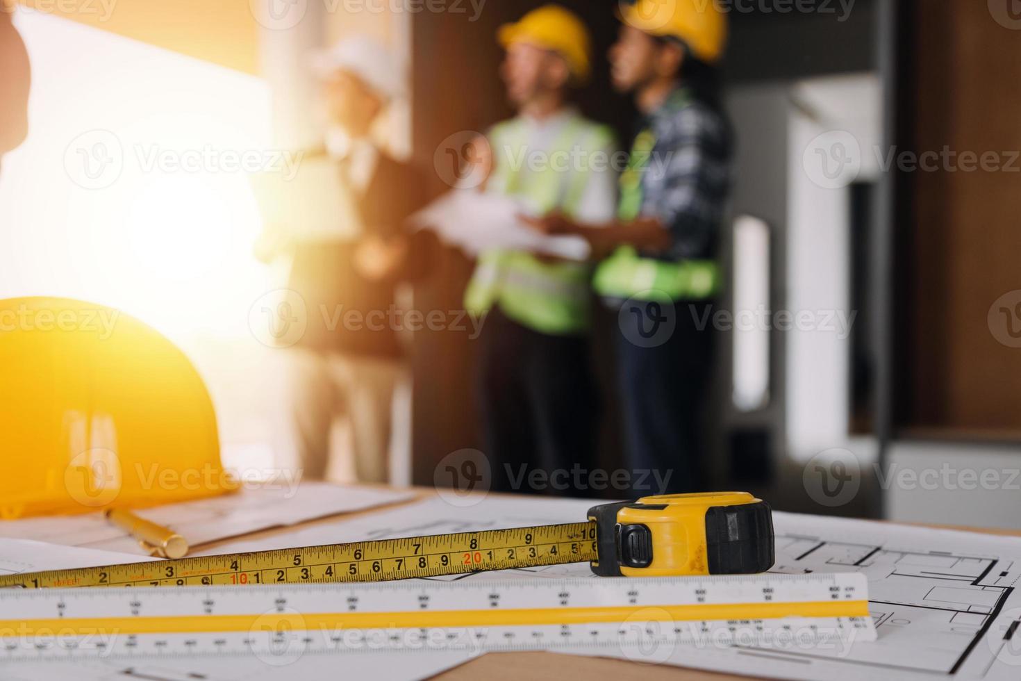 Architect concept, Architects working with blueprints in the office, Vintage Effect photo