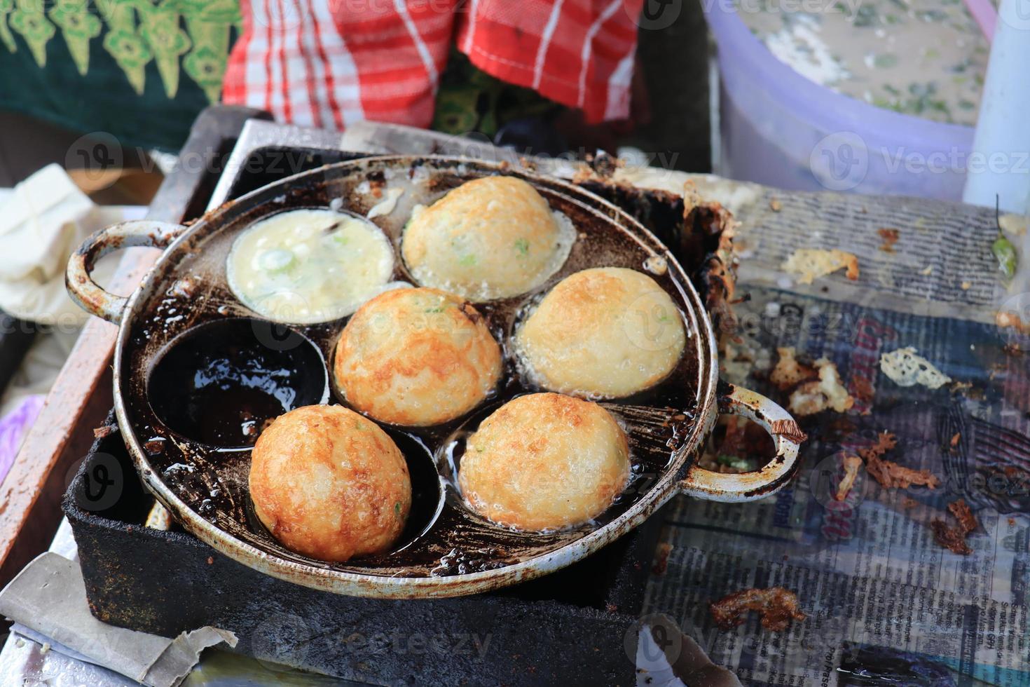 Fried eggs are usually called SD snacks in Indonesia which have been shaped and cooked ready to be put in a container and given toppings photo