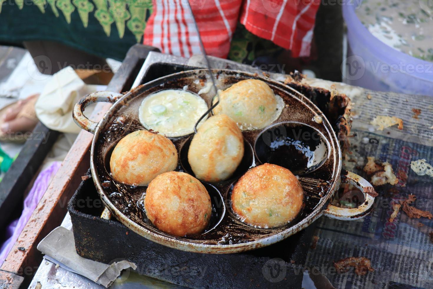 Fried eggs are usually called SD snacks in Indonesia which have been shaped and cooked ready to be put in a container and given toppings photo