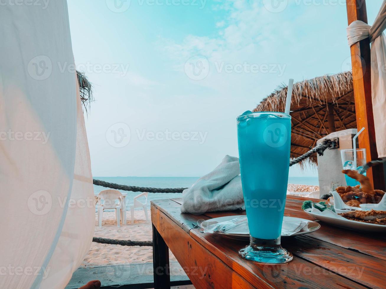 Travel beach summer season time umbrella soft drink blue Hawaii beverage glass juice cool water sea sand sun ocean sky outdoor relax fruit natural event party happy holiday luxury tourism refreshment photo