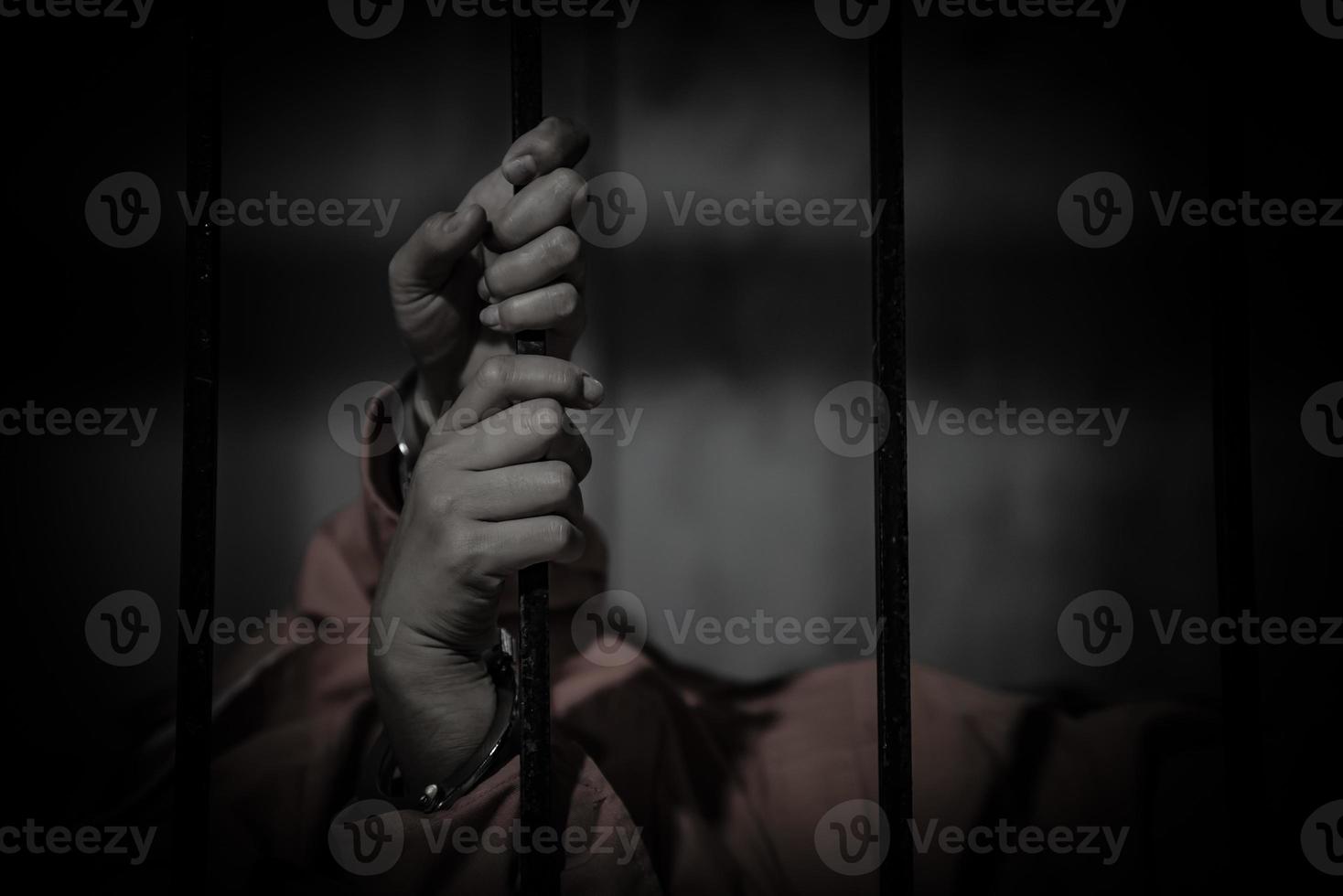 Hands of women desperate to catch the iron prison,prisoner concept,thailand people,Hope to be free,If the violate the law would be arrested and jailed. photo