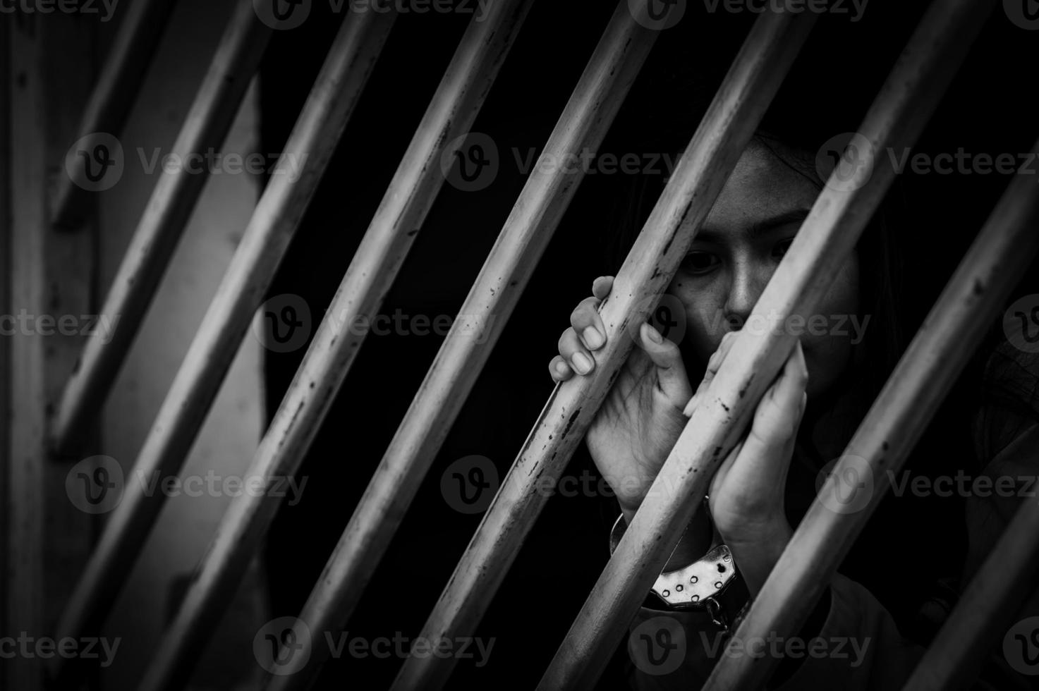 Hands of women desperate to catch the iron prison,prisoner concept,thailand people,Hope to be free,If the violate the law would be arrested and jailed. photo