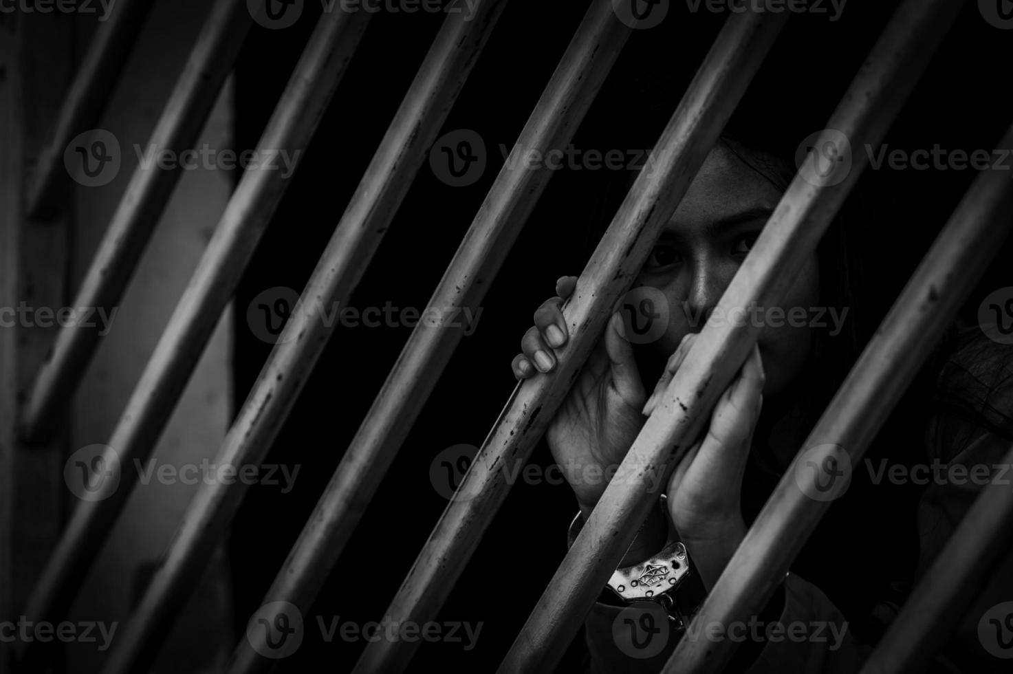 Hands of women desperate to catch the iron prison,prisoner concept,thailand people,Hope to be free,If the violate the law would be arrested and jailed. photo