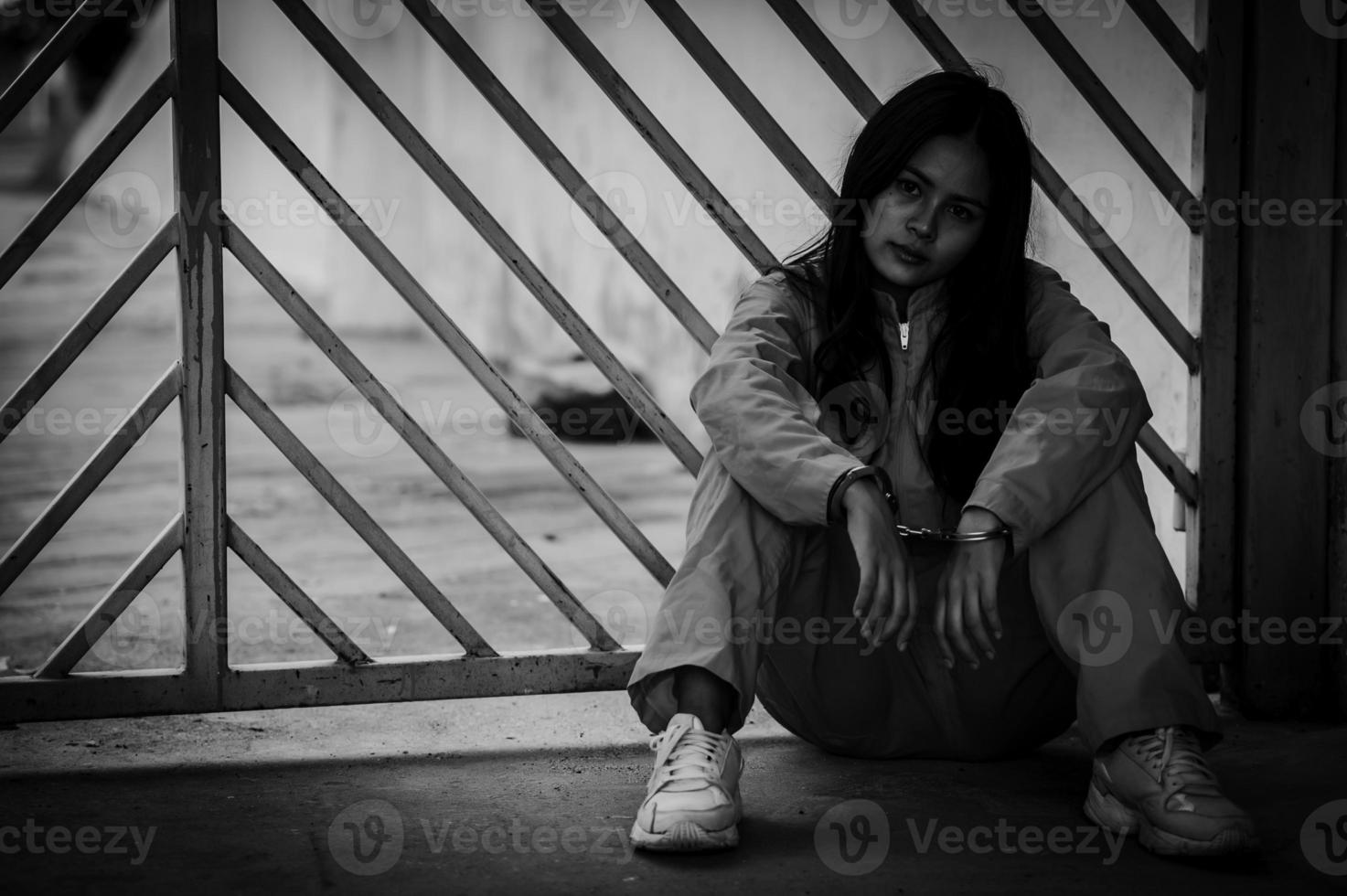 Hands of women desperate to catch the iron prison,prisoner concept,thailand people,Hope to be free,If the violate the law would be arrested and jailed. photo