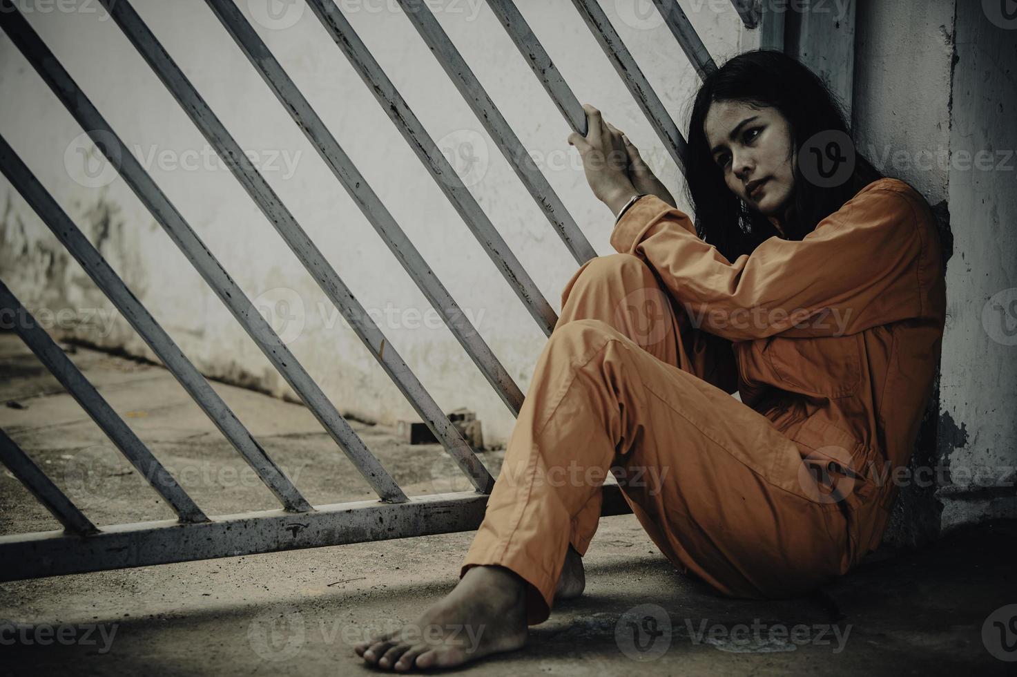 Hands of women desperate to catch the iron prison,prisoner concept,thailand people,Hope to be free,If the violate the law would be arrested and jailed. photo