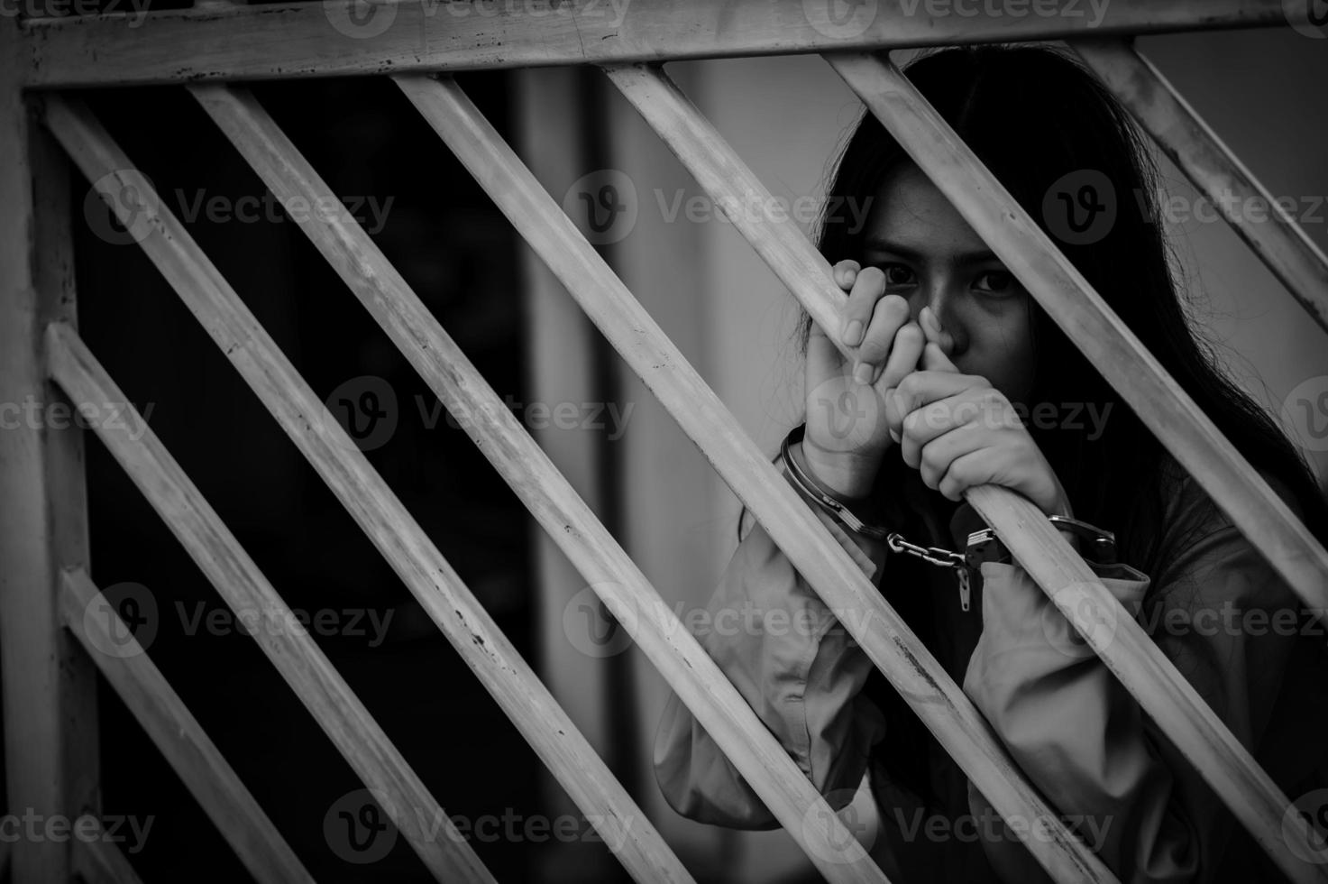 Hands of women desperate to catch the iron prison,prisoner concept,thailand people,Hope to be free,If the violate the law would be arrested and jailed. photo