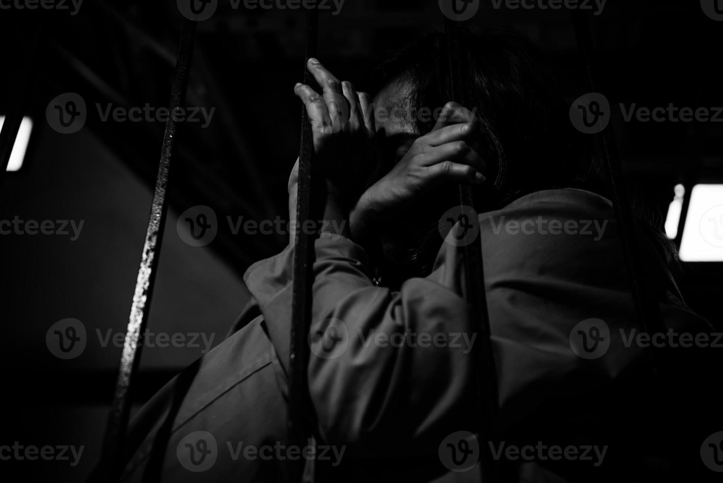 Hands of women desperate to catch the iron prison,prisoner concept,thailand people,Hope to be free,If the violate the law would be arrested and jailed. photo