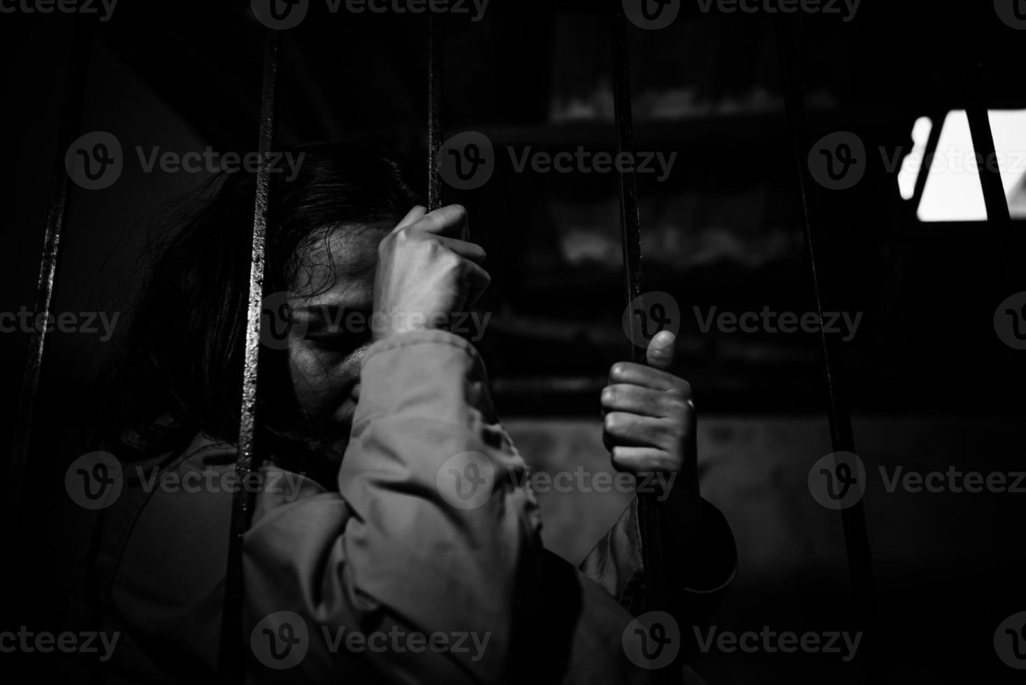 Hands of women desperate to catch the iron prison,prisoner concept,thailand people,Hope to be free,If the violate the law would be arrested and jailed. photo