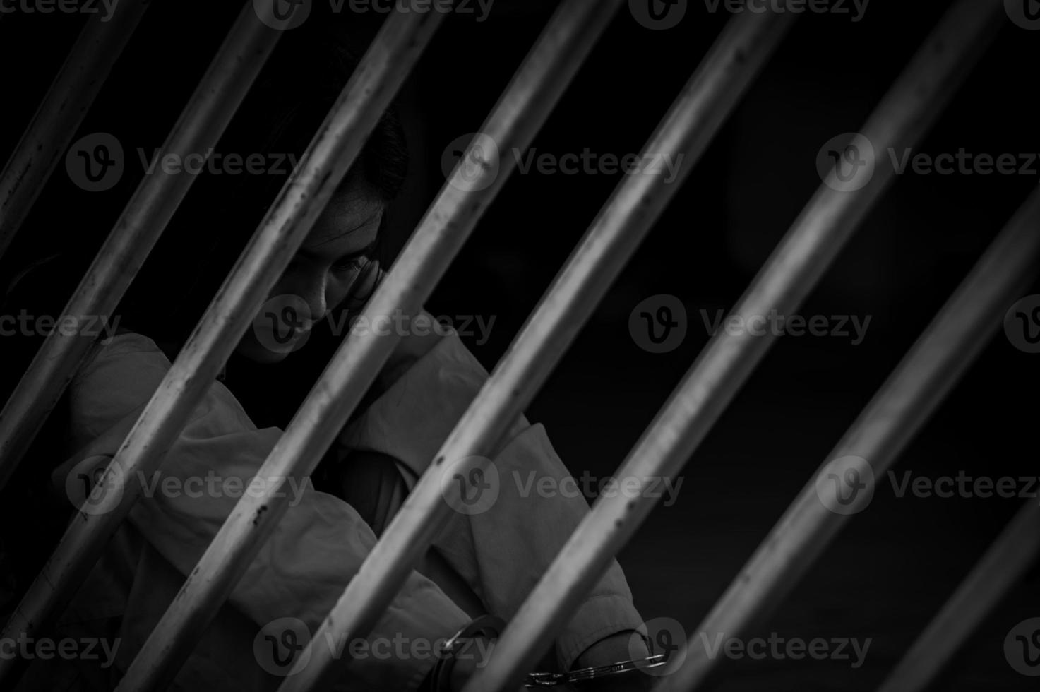 Hands of women desperate to catch the iron prison,prisoner concept,thailand people,Hope to be free,If the violate the law would be arrested and jailed. photo