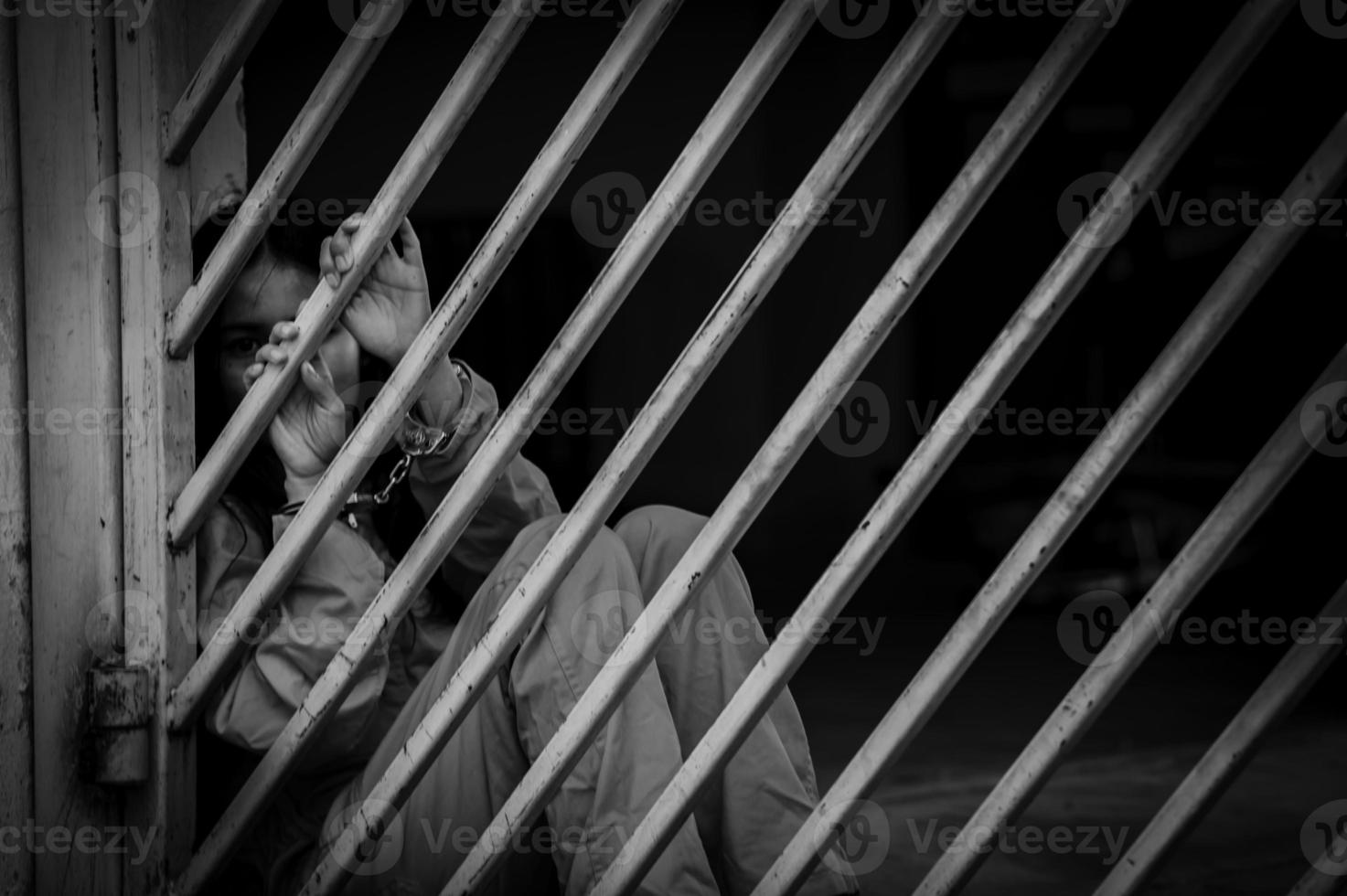 Hands of women desperate to catch the iron prison,prisoner concept,thailand people,Hope to be free,If the violate the law would be arrested and jailed. photo