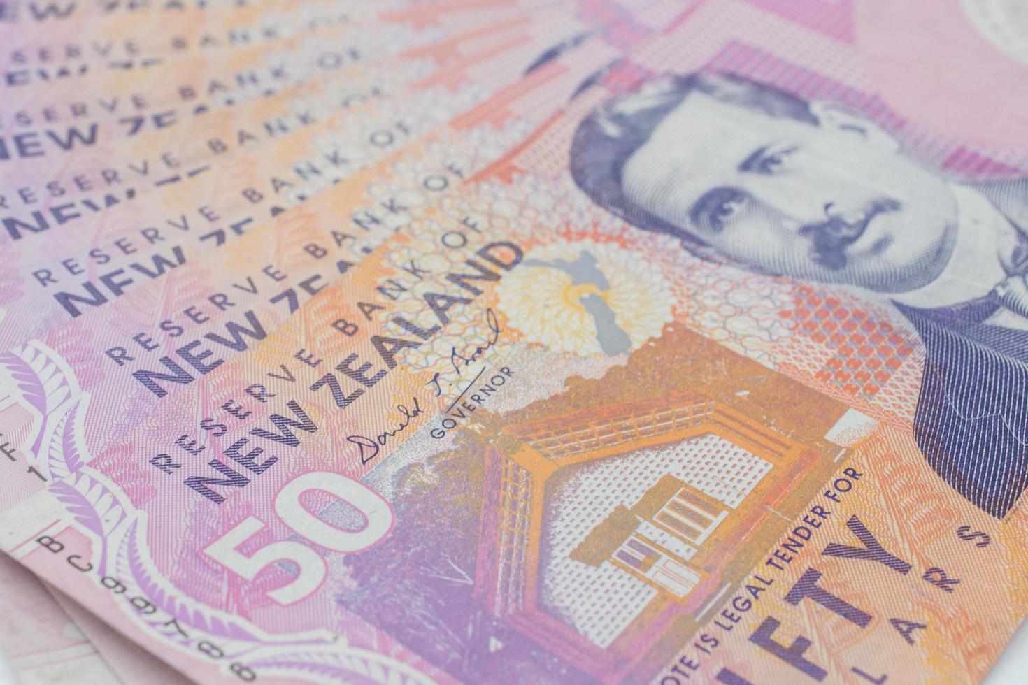 New Zealand 50 dollars bank note on isolated white background. The New Zealand Dollar is the official currency of New Zealand. photo