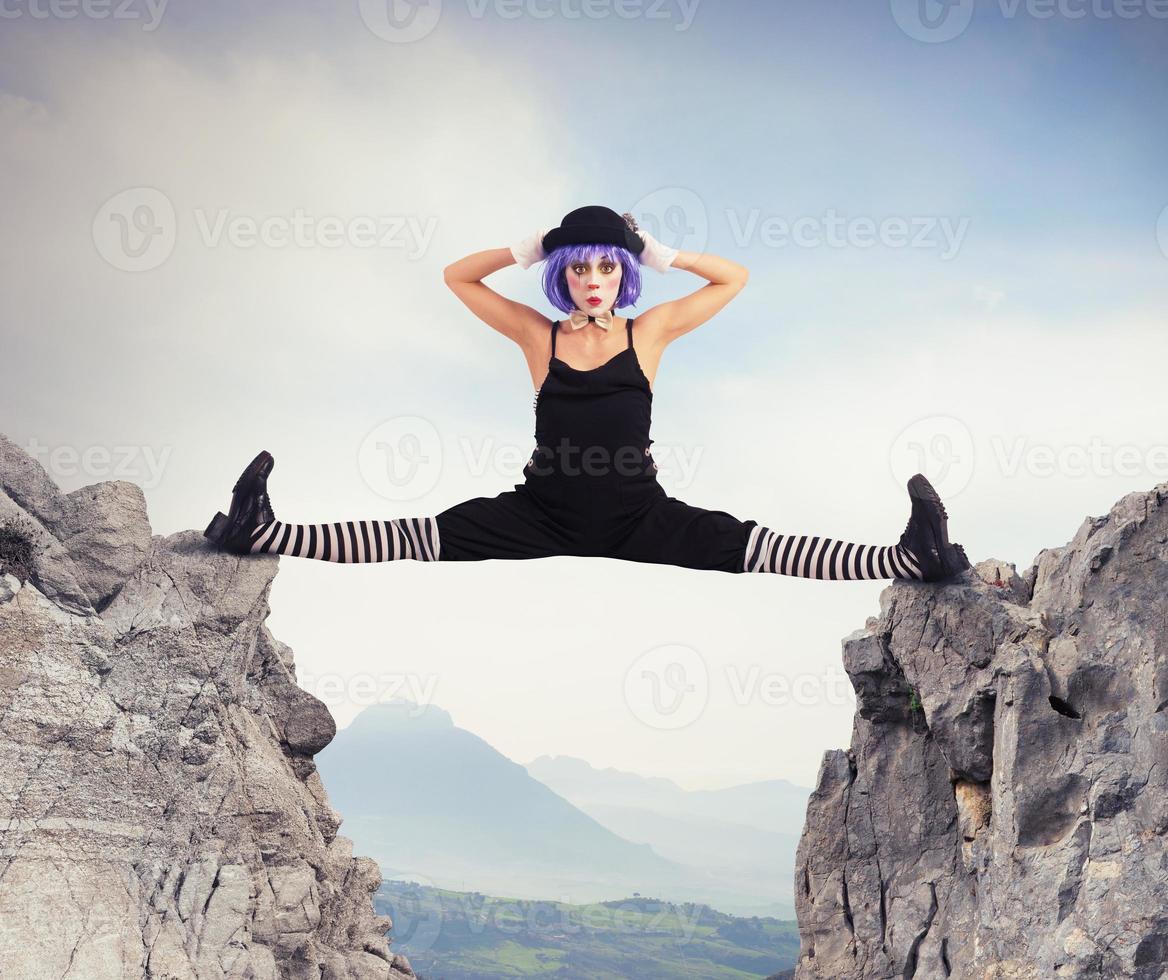 Clown between two mountains photo