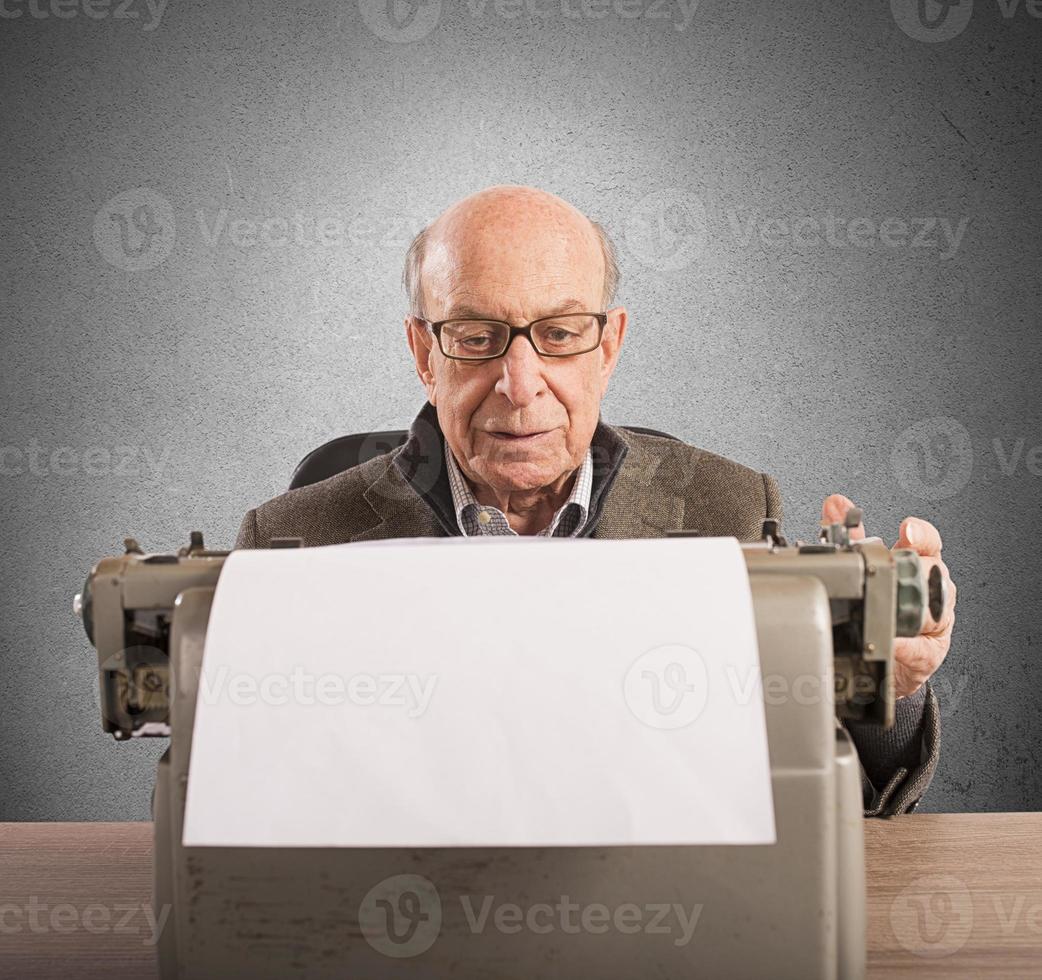 Elder writes with typewriter photo