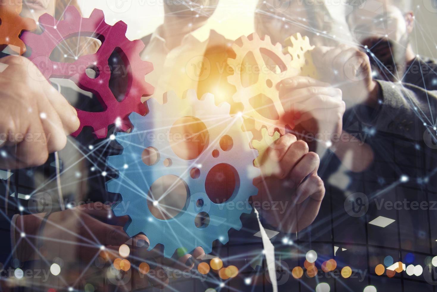 Business team connect pieces of gears. Teamwork, partnership and integration concept. Double exposure photo