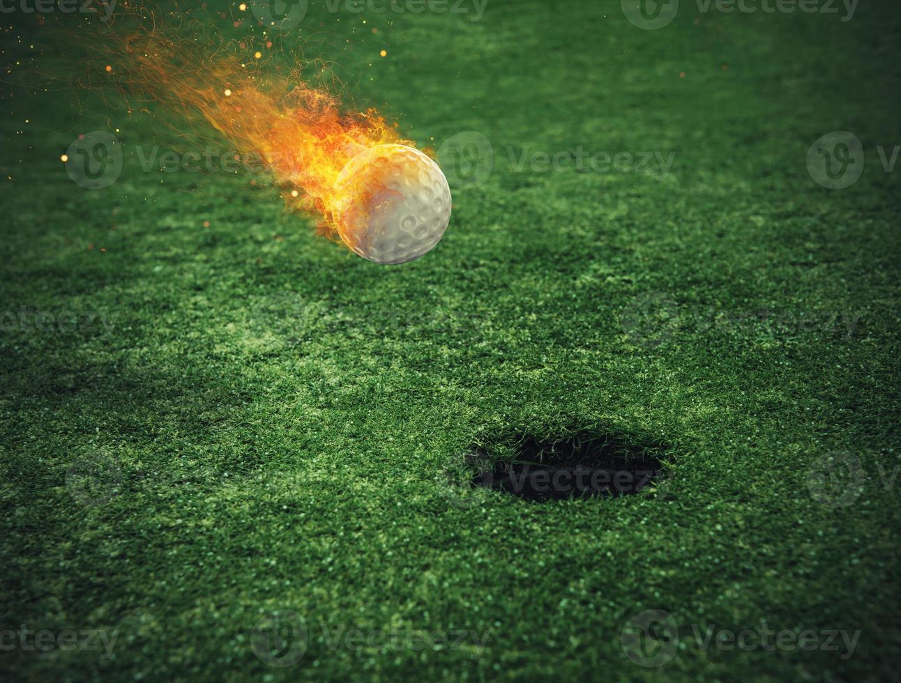 Fiery golf ball near the hole in a grass field photo