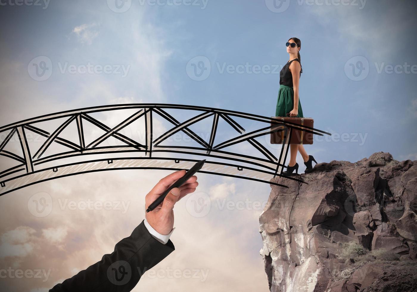 Woman crosses a bridge photo