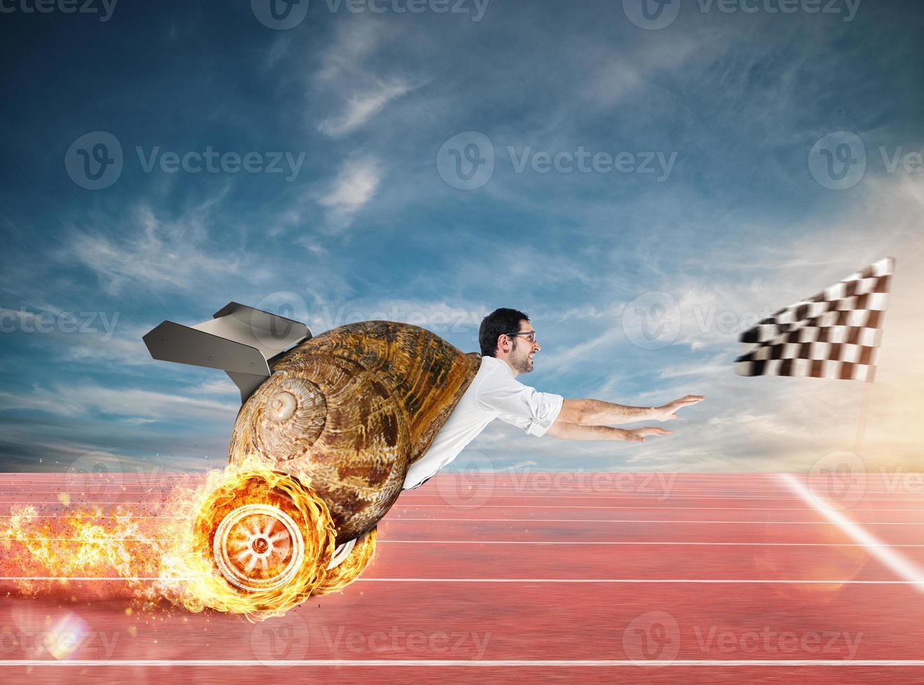 Businessman like a snail runs fast as a race car photo