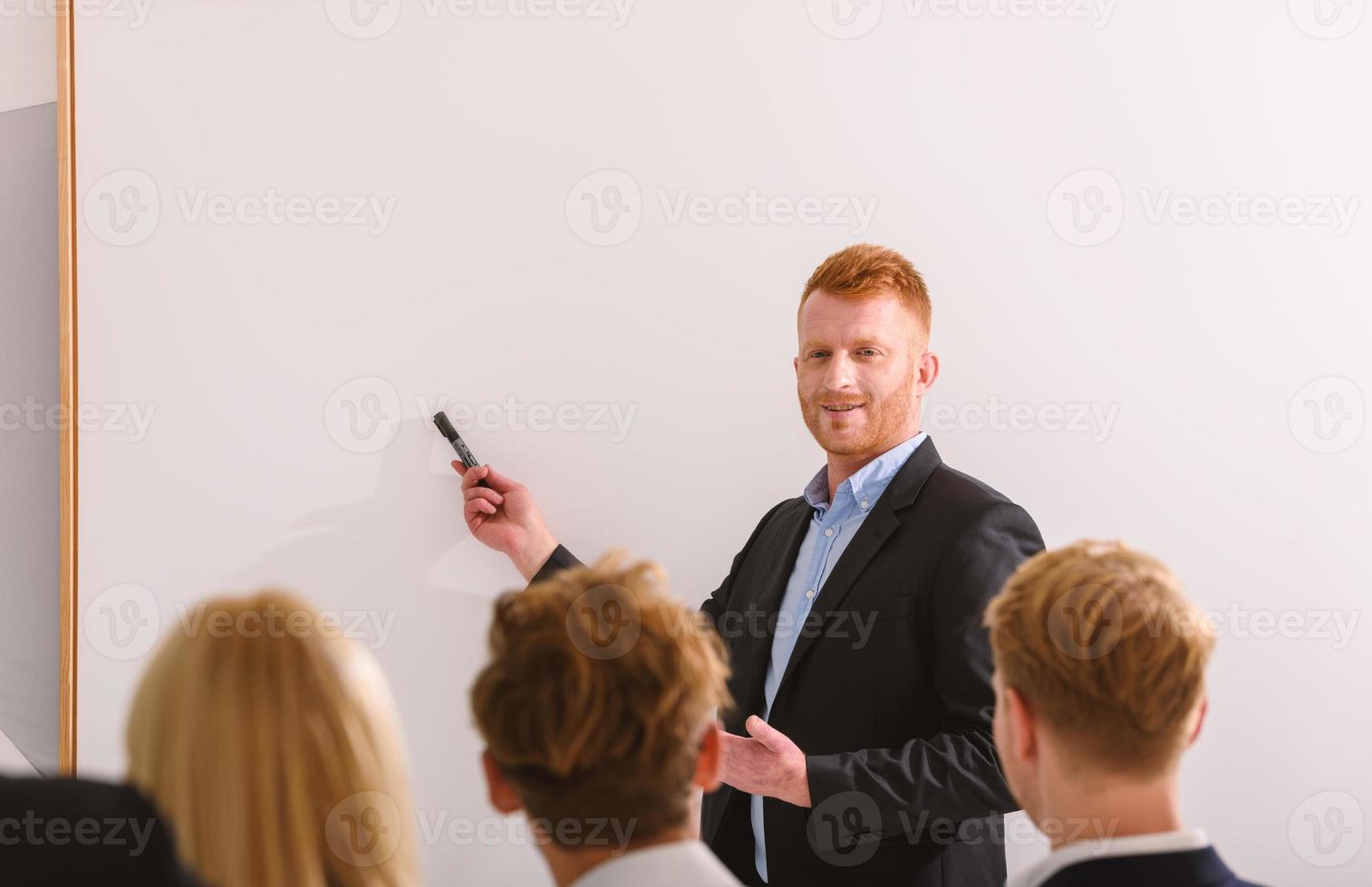 Businessman do training during a business meeting photo