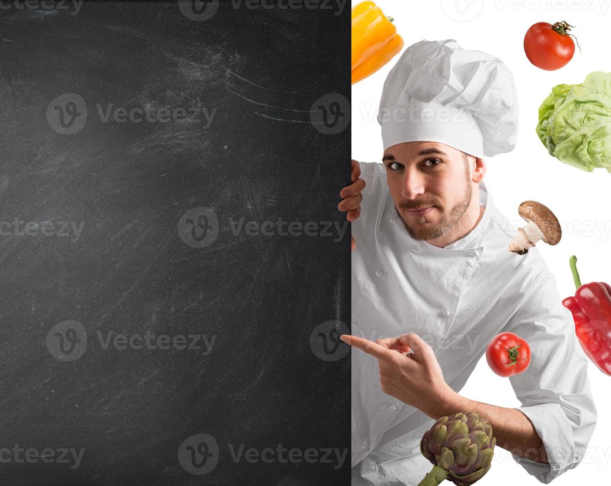 Chef with blackboard photo