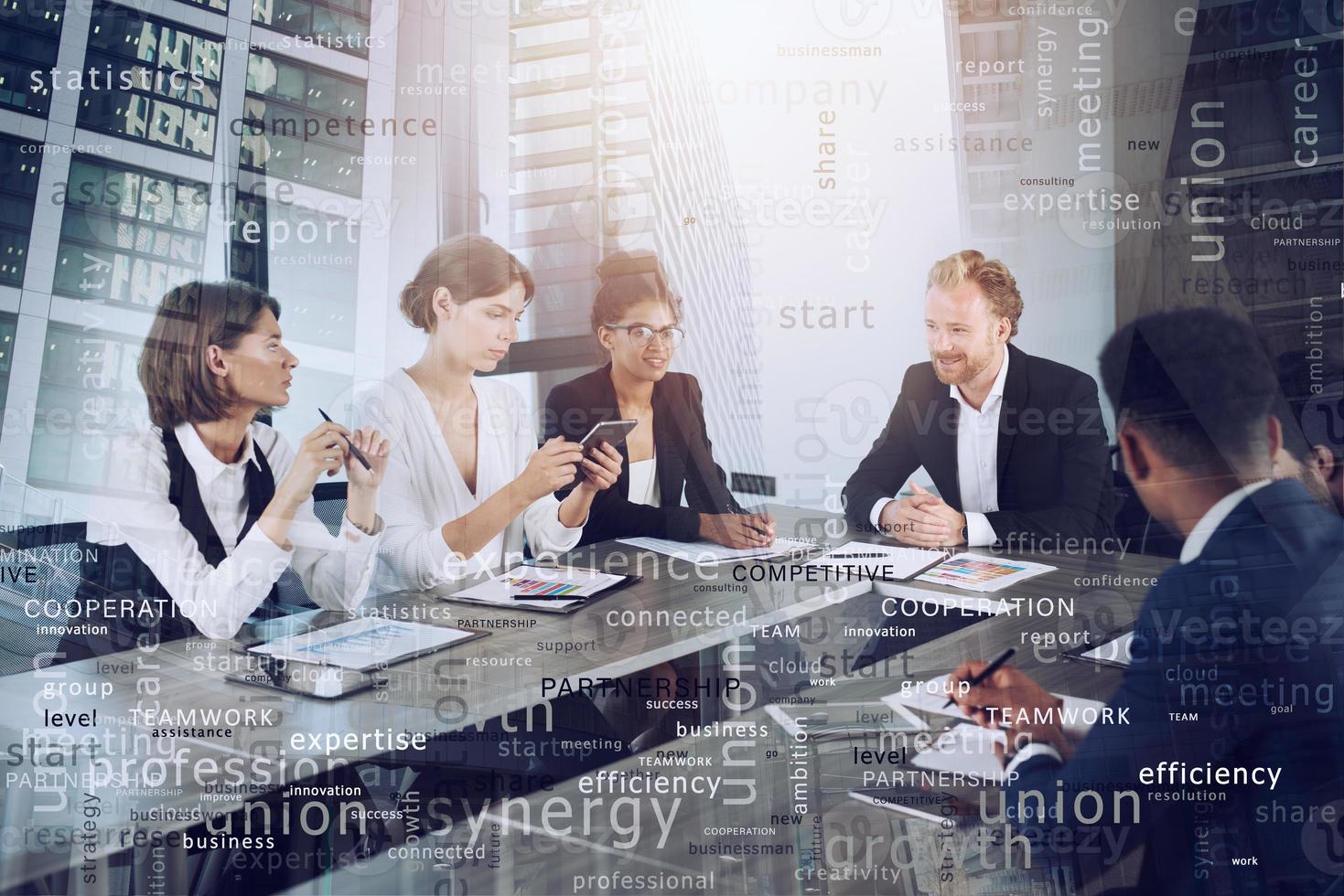 Team of people work together. concept of teamwork and partnership. Most important business terms in overlay photo