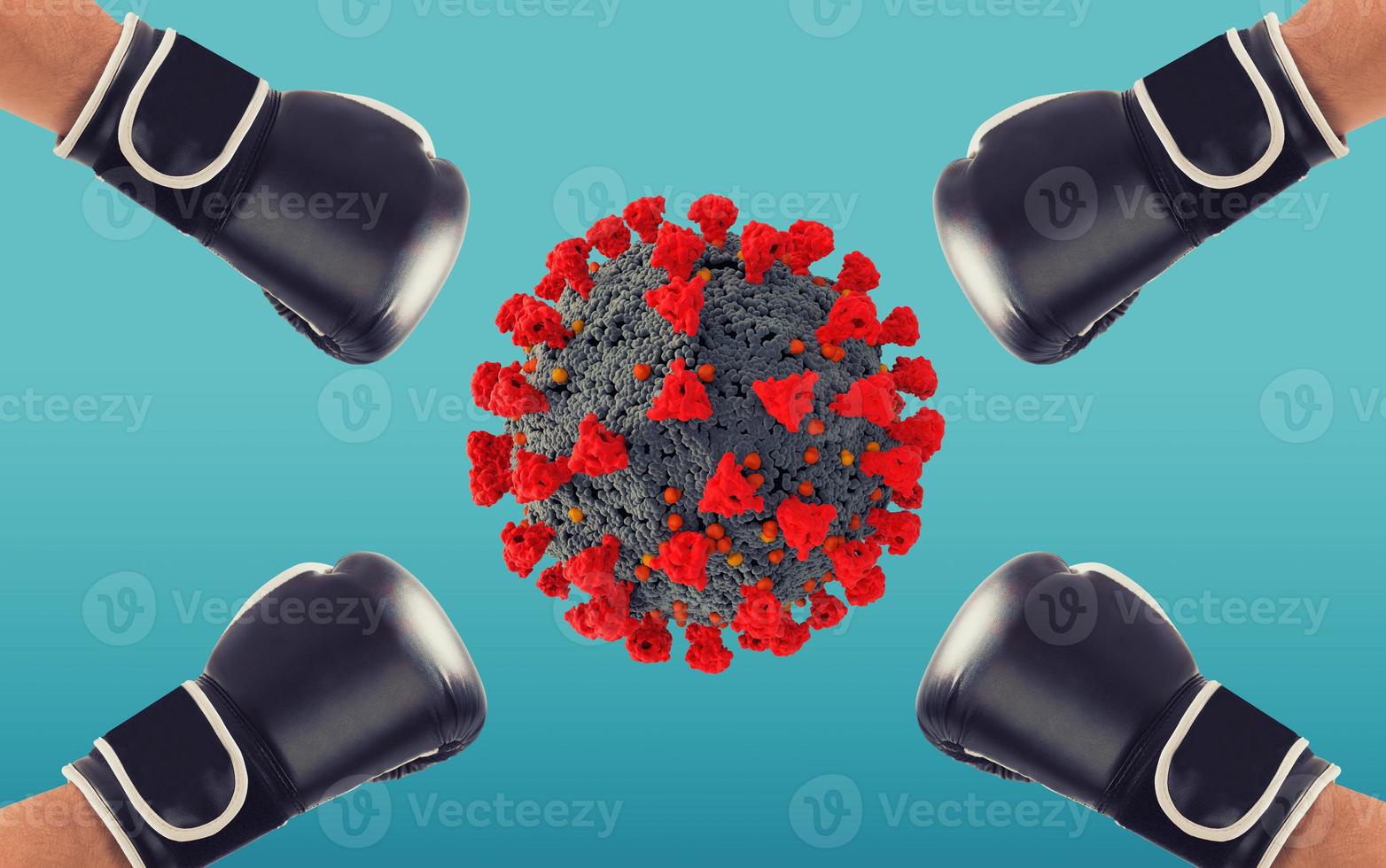Punch with boxing glove hits the virus on cyan background photo