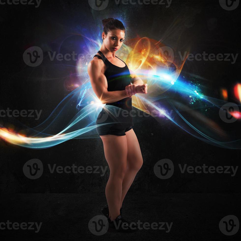 Energy of muscular woman photo