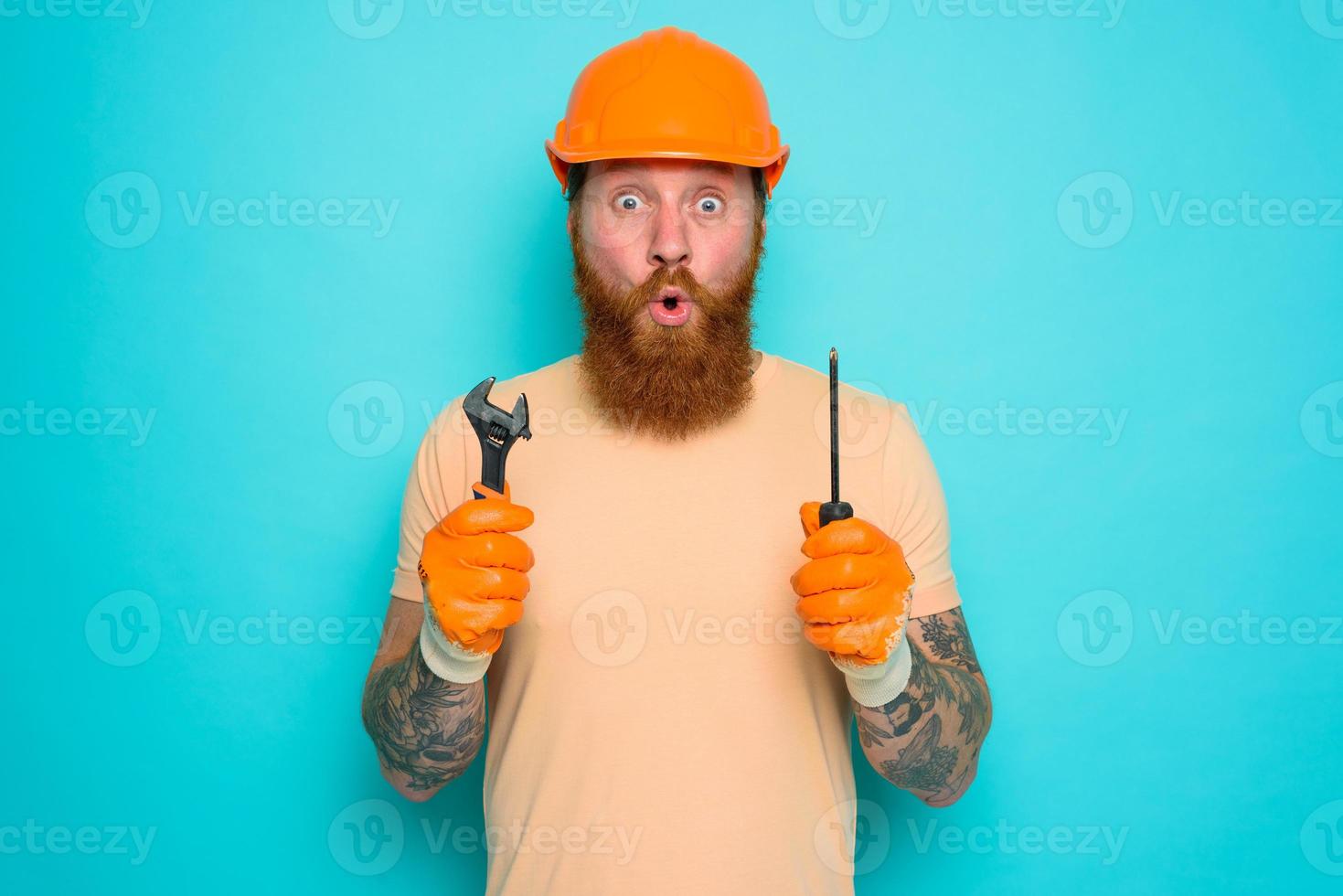 Incompetent worker is afraid and worried about his work photo