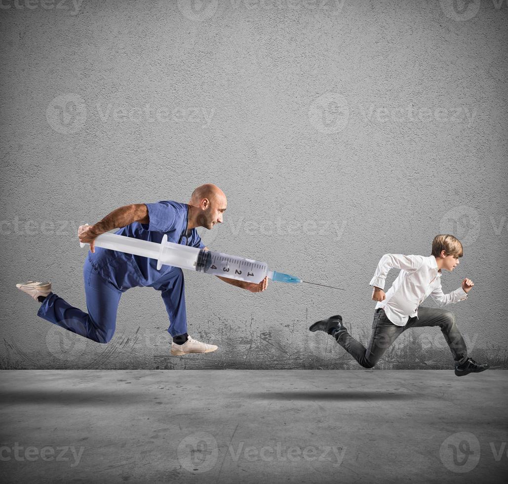 Fear of the vaccine concept with running child photo