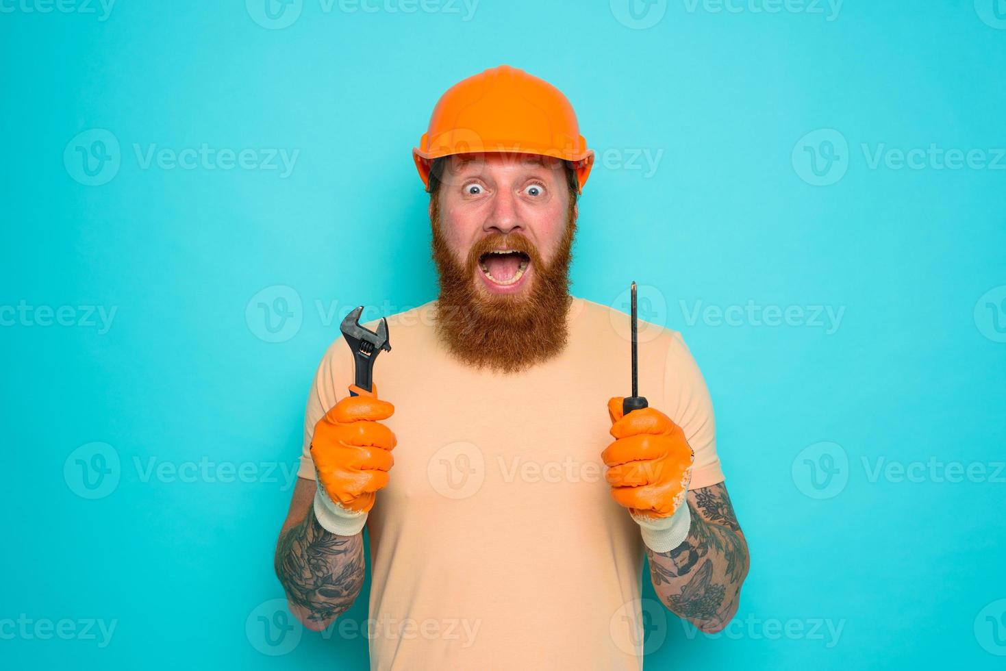 Incompetent worker is afraid and worried about his work photo