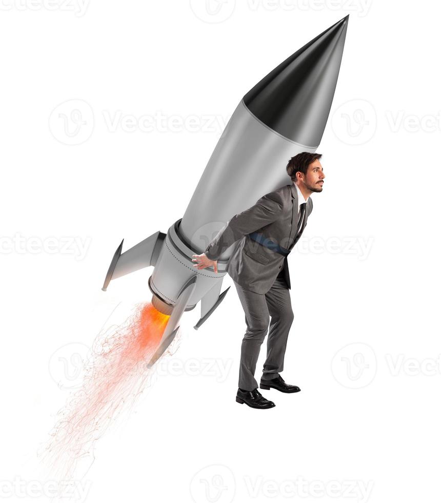 Determination and power businessman that holds a rocket isolated on white background. Increase, away. photo