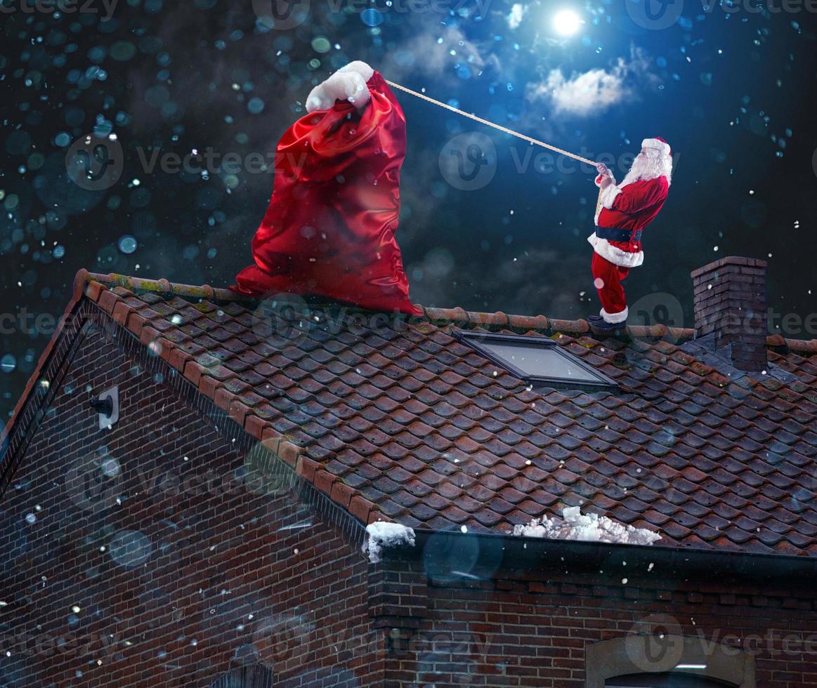 Santa claus ready to deliver presents for christmas photo